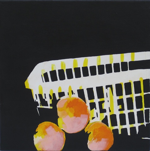 basket and three peaches