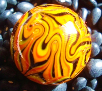 Mad Man Fire Marble

signed by artist "MMM"