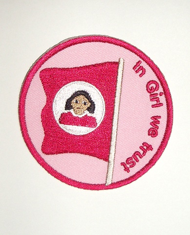 Badge featuring Girl's flag and motto.  Can be sewn onto any fabric clothing or accessory.