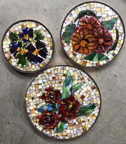 Supporting mosaics of the Sun/Moon collection. Flowers for the "Sun-Side" are created with Fused Glass.