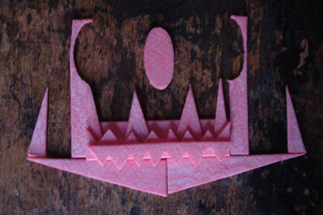 5 sticks of Extra bubble gum sliced by the artist into geometical patterns then arranged into a inaccessible cityscape  moments before being deconstructed and placed into original wrapper and sealed