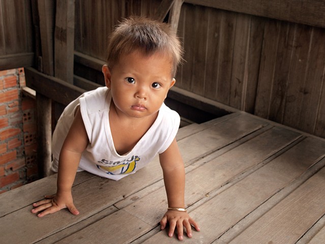 Khmer child at the top of the stairs