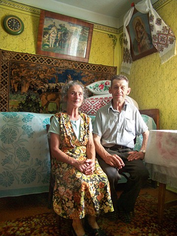 Maria and Mykola in their home
