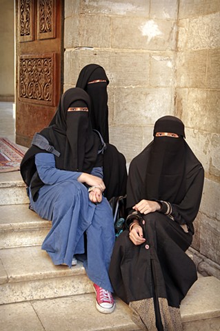 Three young women in niqab