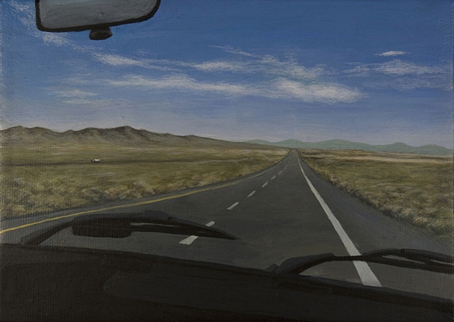 Drive through wide open desert in Nevada.
