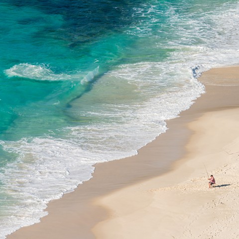 Birds Eye View of Fisherman on the Beach and Turquoise Waters