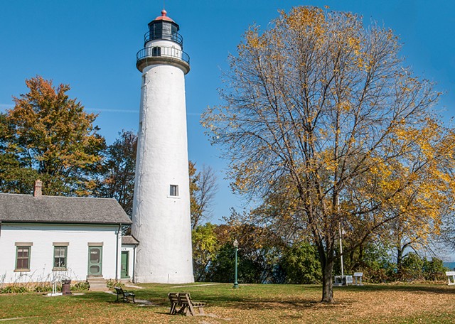 The fall colours and blue sky bring out the best in this lighthouse.