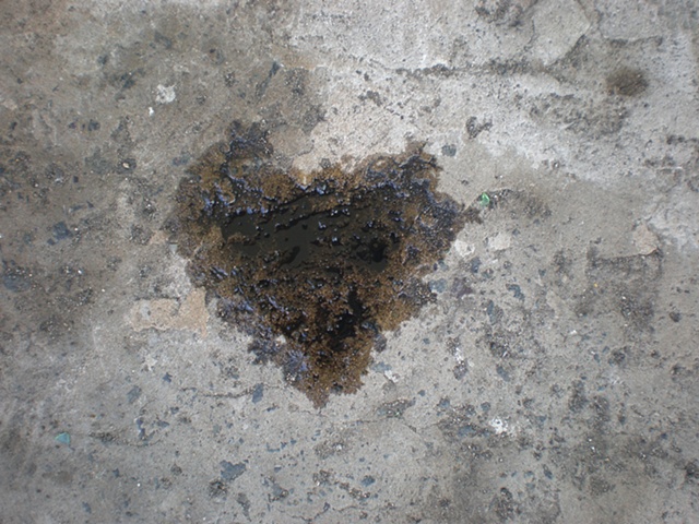 'Concrete Illusions: Not Everything Is As It Seems'
Random photo of a found residue oil stain in the shape of a heart