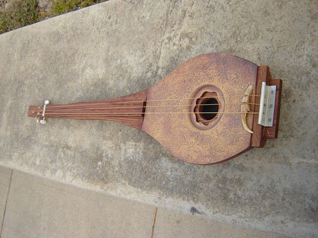 Claytar (ceramic and wood electric guitar)