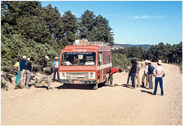 Vincent, Forest and fellow passengers waiting for a tire change on the bus from Creele to Batopilas, 1985.