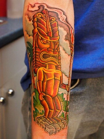 tiki tattoo by markus anacki at kaleidoscope tattoo shop in cambridge boston color tattoo