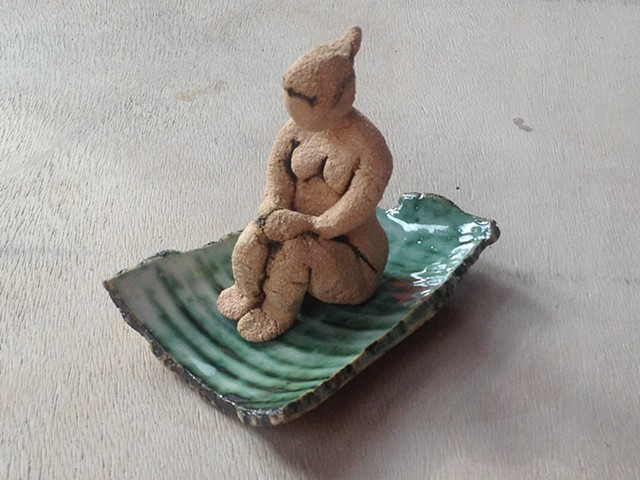 Figurine on green shard £150