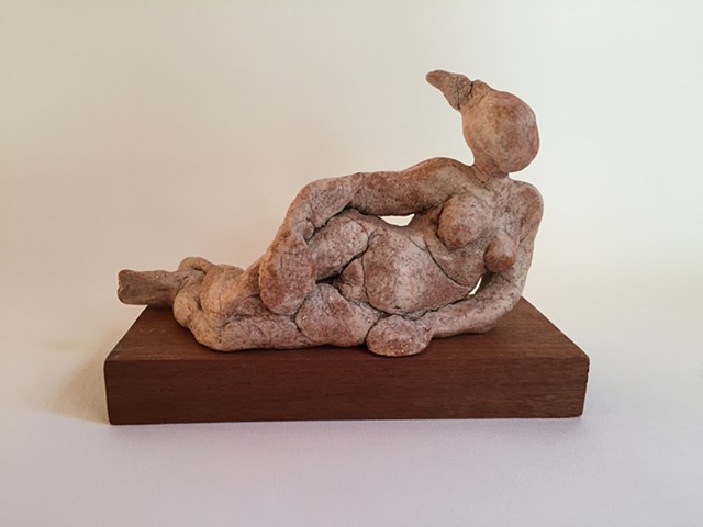 Reclining figurine front view