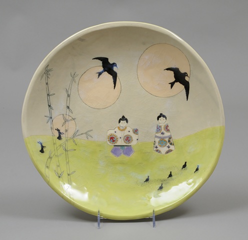 platter with 2 asian dolls
