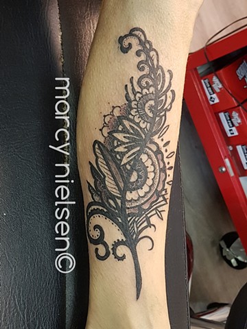 henna geometric feather tattoo