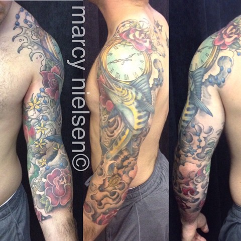 neotraditional sleeve tattoo