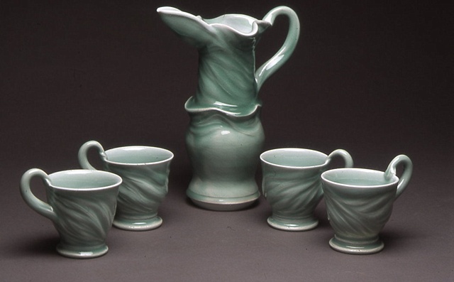 pitcher and cups
