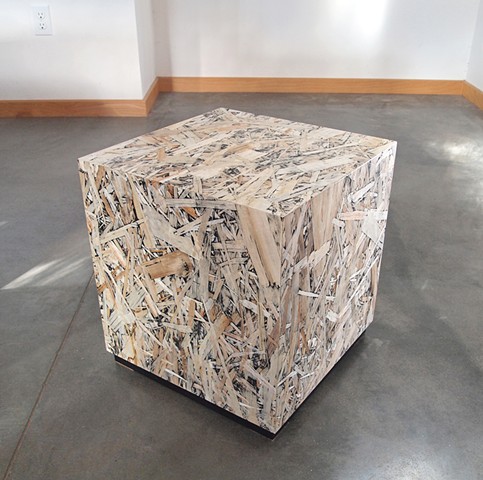 Modern OSB cube table with black inlay finish. Handmade 14" cube table by Andrew Traub Studio.