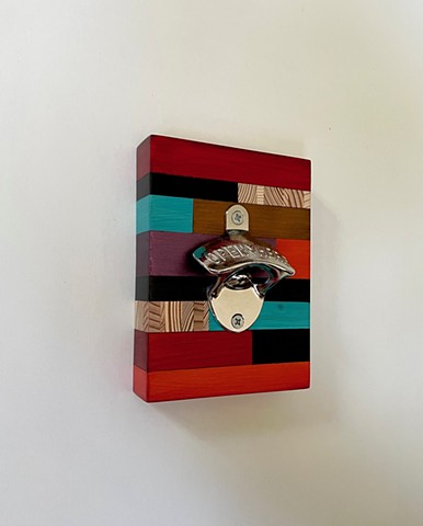 Del Rey Bottle Opener, wall hanging with mixed media color over salvaged wood. Handmade by Andrew Traub