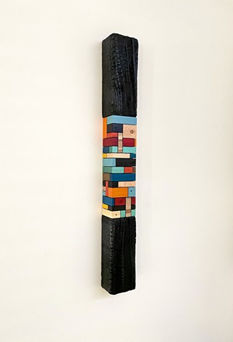 Modern art-contemporary craft, wood art wall hanging Color Module called "Resolano", salvaged wood with mixed media color, carbonized wood, by Andrew Traub. Mid century art for the 21st century.