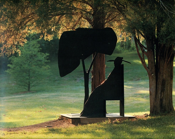 Poet Sitting by Tree in Chair, 1975
