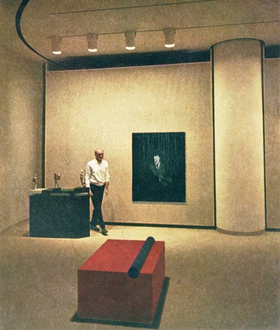 Johnson with works in his collection by Ernest Trova, Francis Bacon, and Donald Judd.