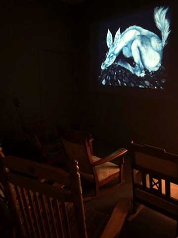 Sala Diaz Video Projection and rocking chair room