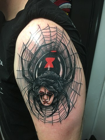 Traditional black widow tattoo