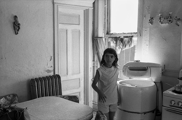 Girl and washing machine, Patterson Street apartment, Chicago