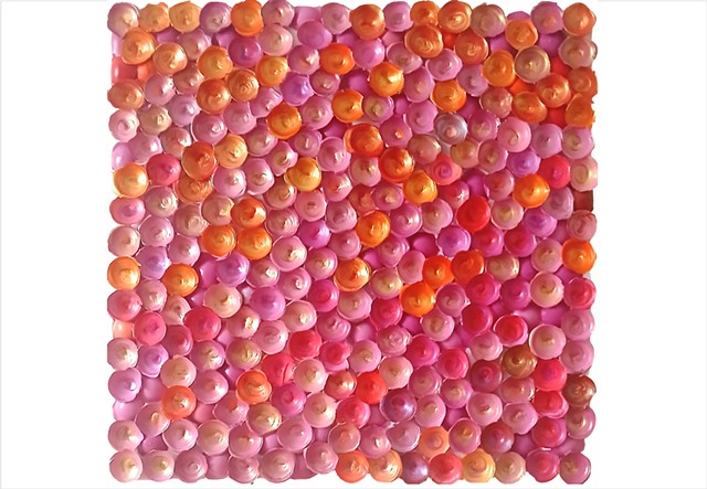 Autumnal 1 by Julee Latimer, sculptural painting composed of clustered paint forms in metallic pinks and oranges.