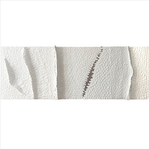 Third Release by Julee Latimer is a contemporary wall sculpture featuring four raised waves that erupt from the canvas which is covered with a densely layered facade of white paint elements and an exposed metallic gold strip