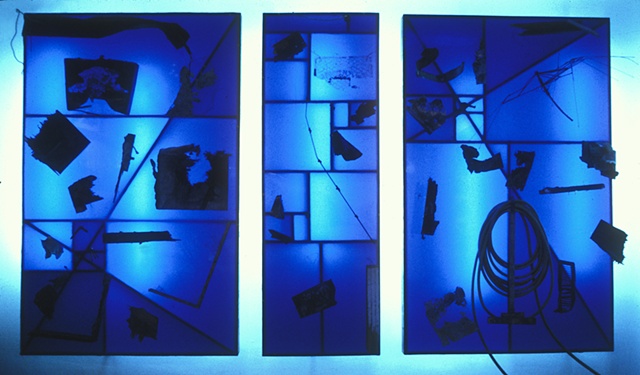 Art remains on blue Plexiglas panels
1995