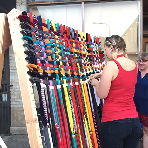 Collaborative weaving created during August First Friday's Art Chase, Allentown neighborhood, Buffalo