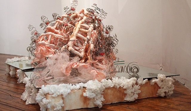 mixed media sculpture using bridesmaid dress and mattress springs