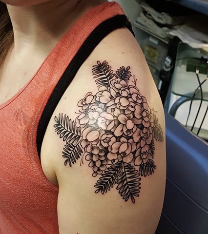 Black and grey botanical tattoo by Sandra Burbul