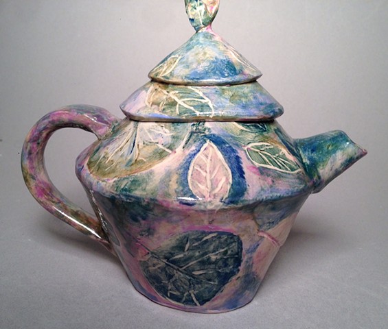 Watercolor teapot is colorful and functional