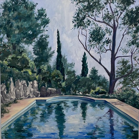 Romantic landscape that almost looks like France but it is Los Angeles. The Italian cypress circling the pool add a timeless elegance to an inviting swim