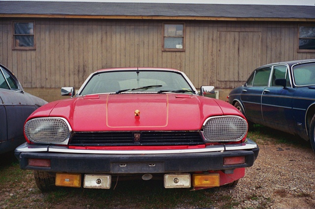 2008 v12 turbo jaguar red front. 