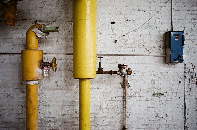 cone mill yellow and blue utility with white wall.