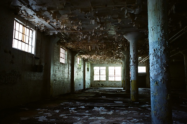 cone mill white room with pillars and extreme texture from top.