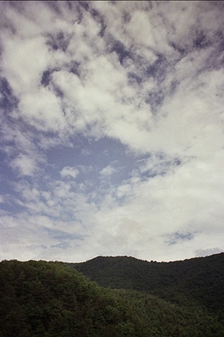 virgina with one flat peak in background and one peak in left foreground. 