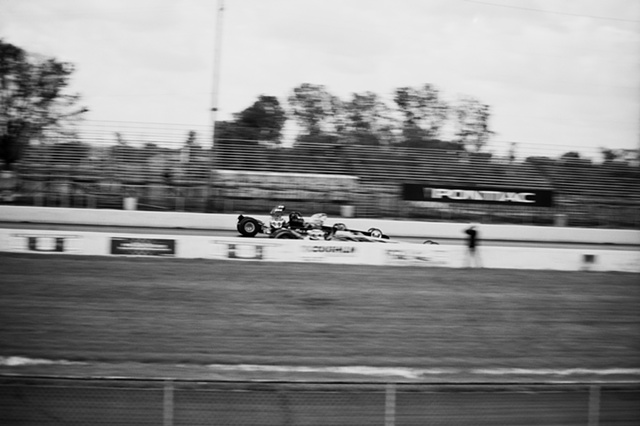 2009 national trails dragsters racing down strip. 