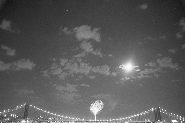 NYC 2009 fireworks over williamsburg bridge. 