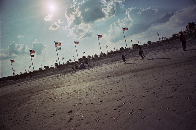 east coast with flags and child pointing.