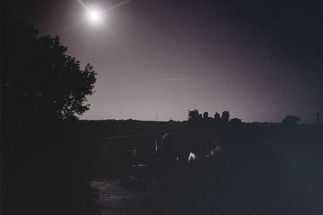 ohio black and white moonrise over farm and friends. 