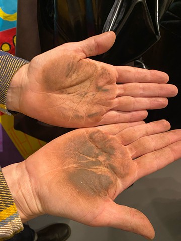 muddied hands