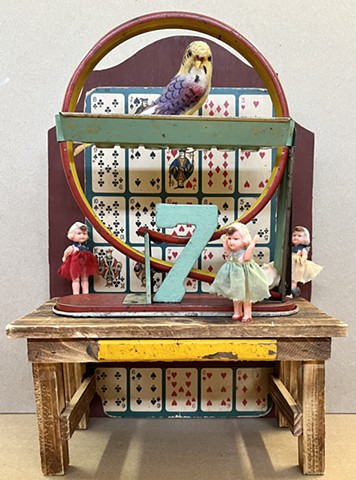 Antique toys dolls Tin game parrot bird