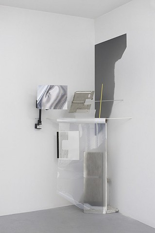 Gambit, 2013. Fiberglass and aluminum rod, film, inkjet print, magnets, monitor components, printer parts, cement, clamp, media arm, rice paper, acrylic paint 70 x 45 x 35 inches