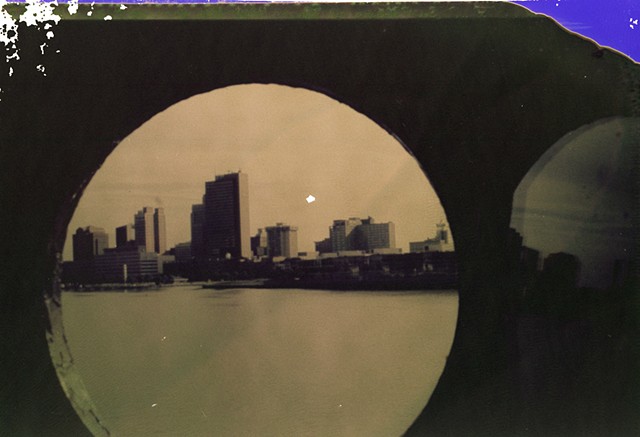Polaroid negative scan- Toledo at sunset Orig. photo shot by Tim Hyma 