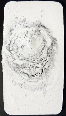 Breaths blown into plaster in conjunction with ink dripped in succession until plaster sets